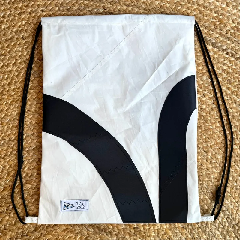 Vela drawstring bag, twin black arcs on white sailcloth