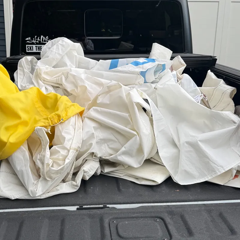 A truck bed full of retired sails